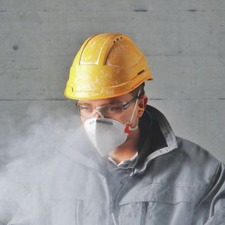 Le maschere per vie respiratorie fanno respirare i suoi dipendenti.