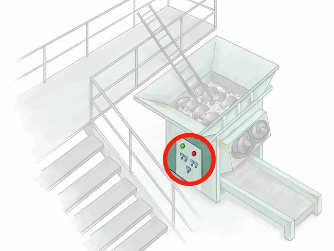 Quand Martin F. monte dans la trémie pour dégager l’échelle, l’interrupteur principal du compacteur n’est pas coupé. Le tableau de commande est entouré en rouge.
